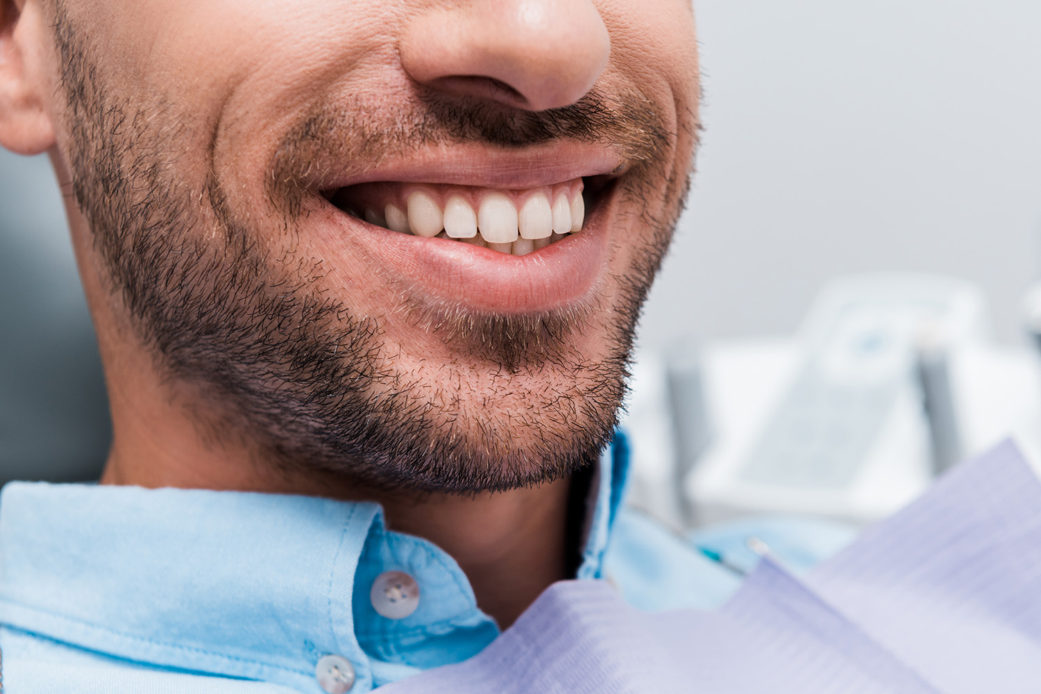 man-smiling-during-dental-visit-health-and-wellne-2026-09-22-21-25-09-utc